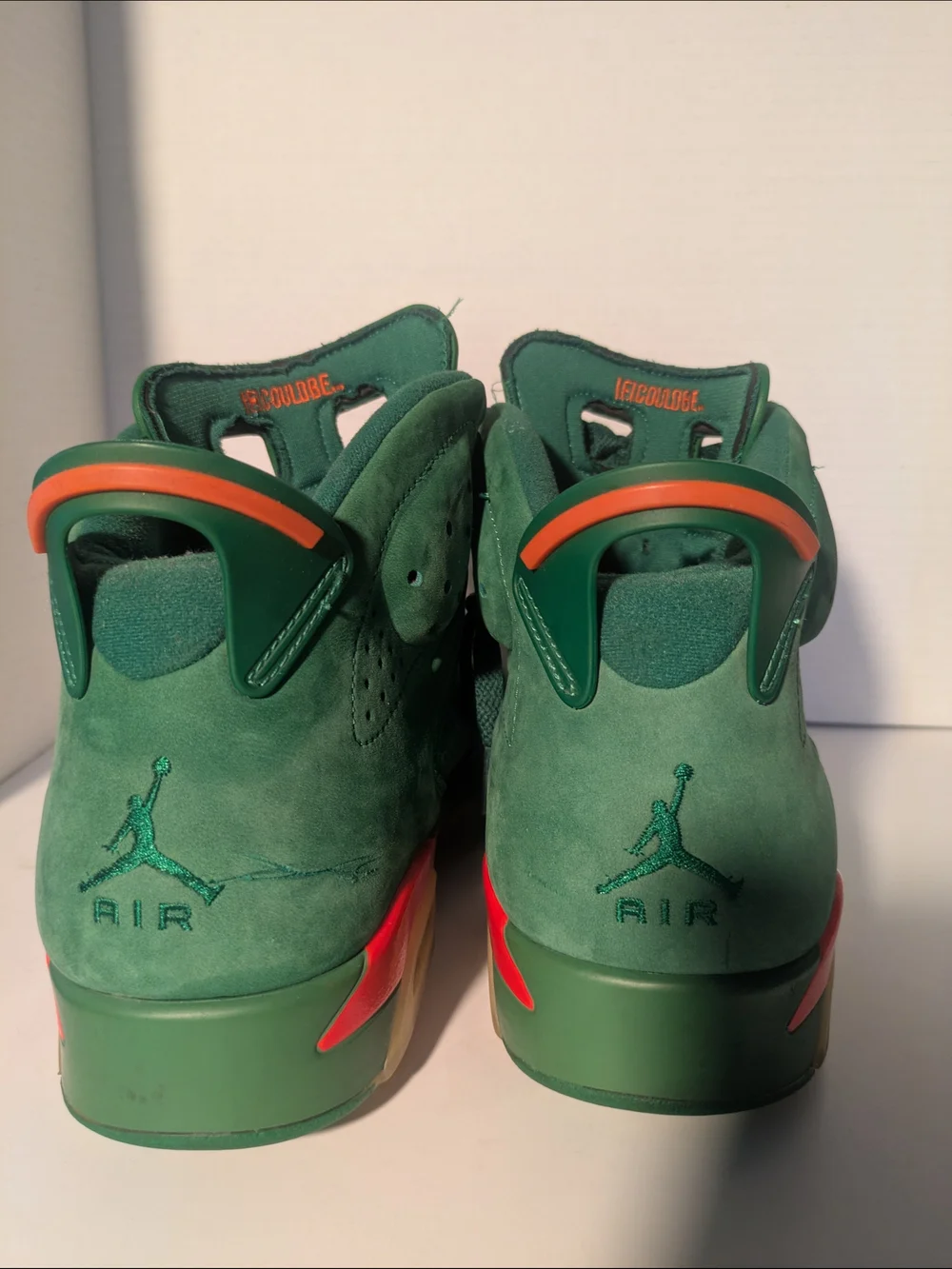 Jordan Men's Green Suede Athletic Shoes with Orange Accents